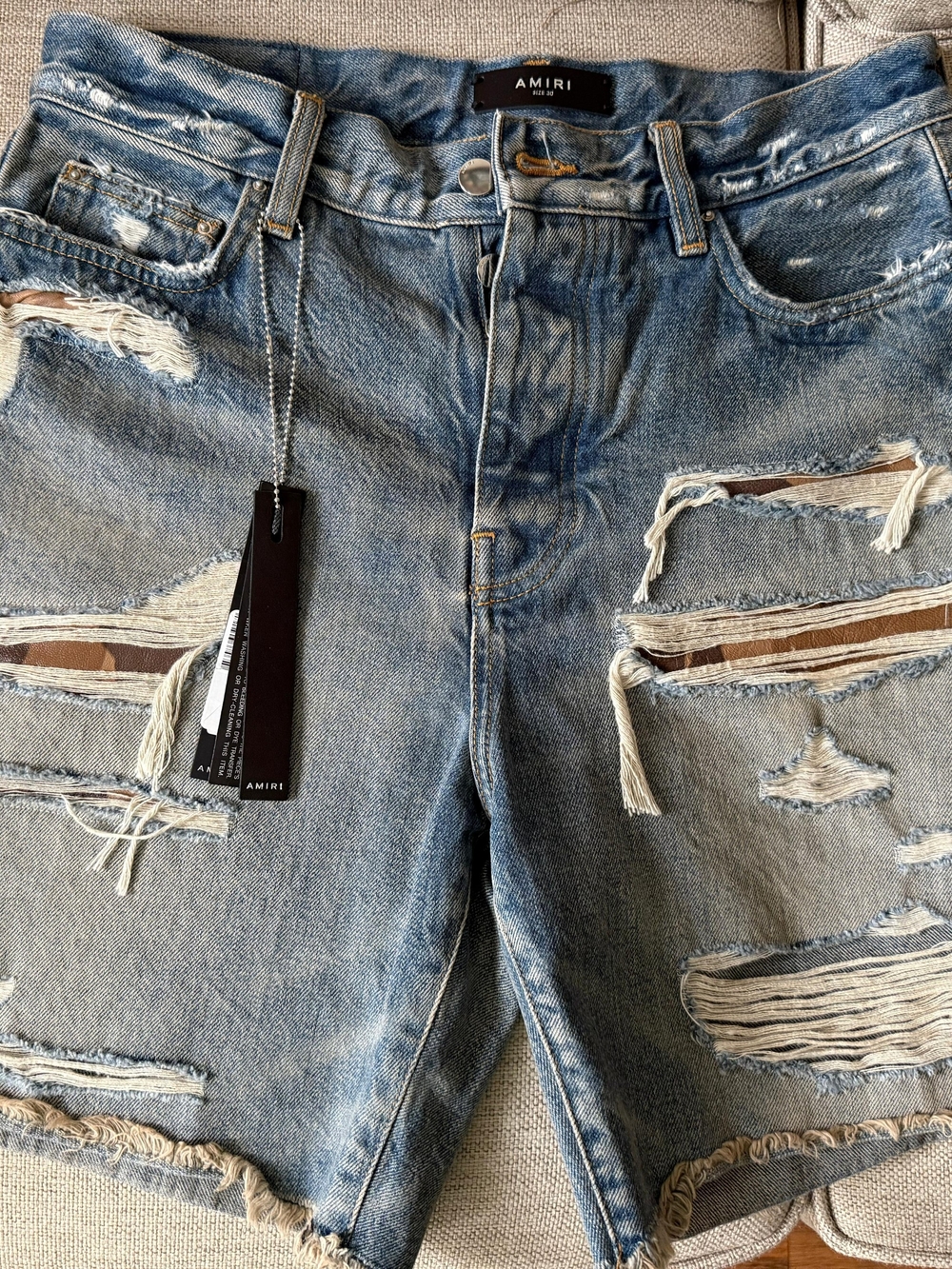 AMIRI Distressed Light Blue Denim Shorts